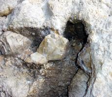 -The block had holes like a